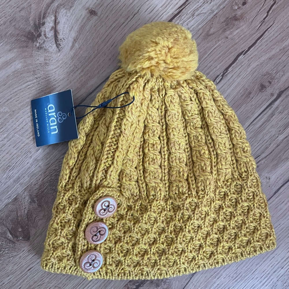 Aran 100% merino wool yellow pom pom hat